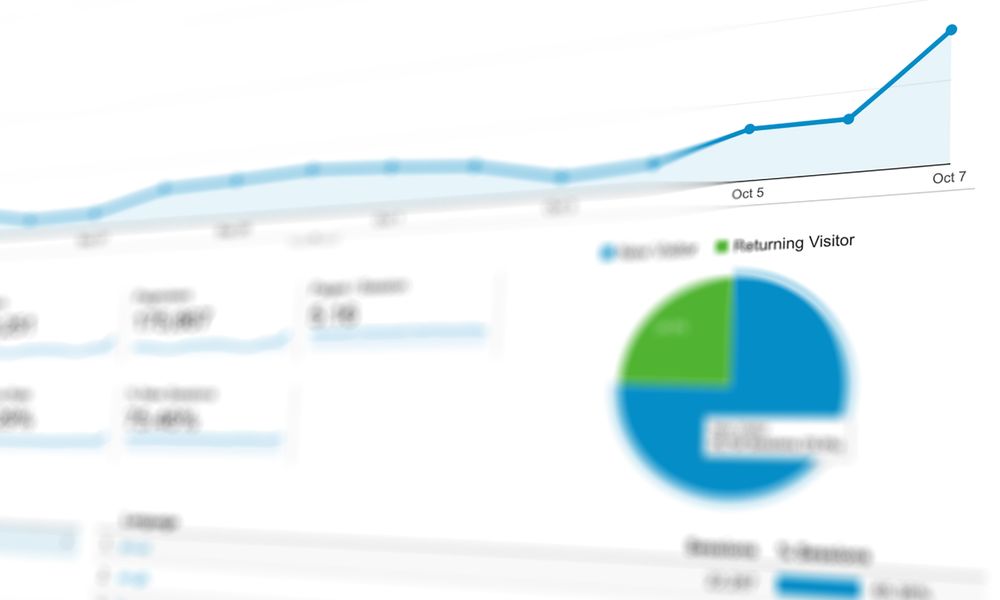 Abstract visualization of data analytics with graphs and charts showing dynamic growth.