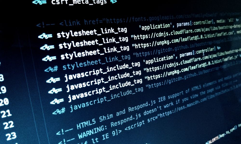 Detailed view of HTML and JavaScript code displayed on a computer monitor.